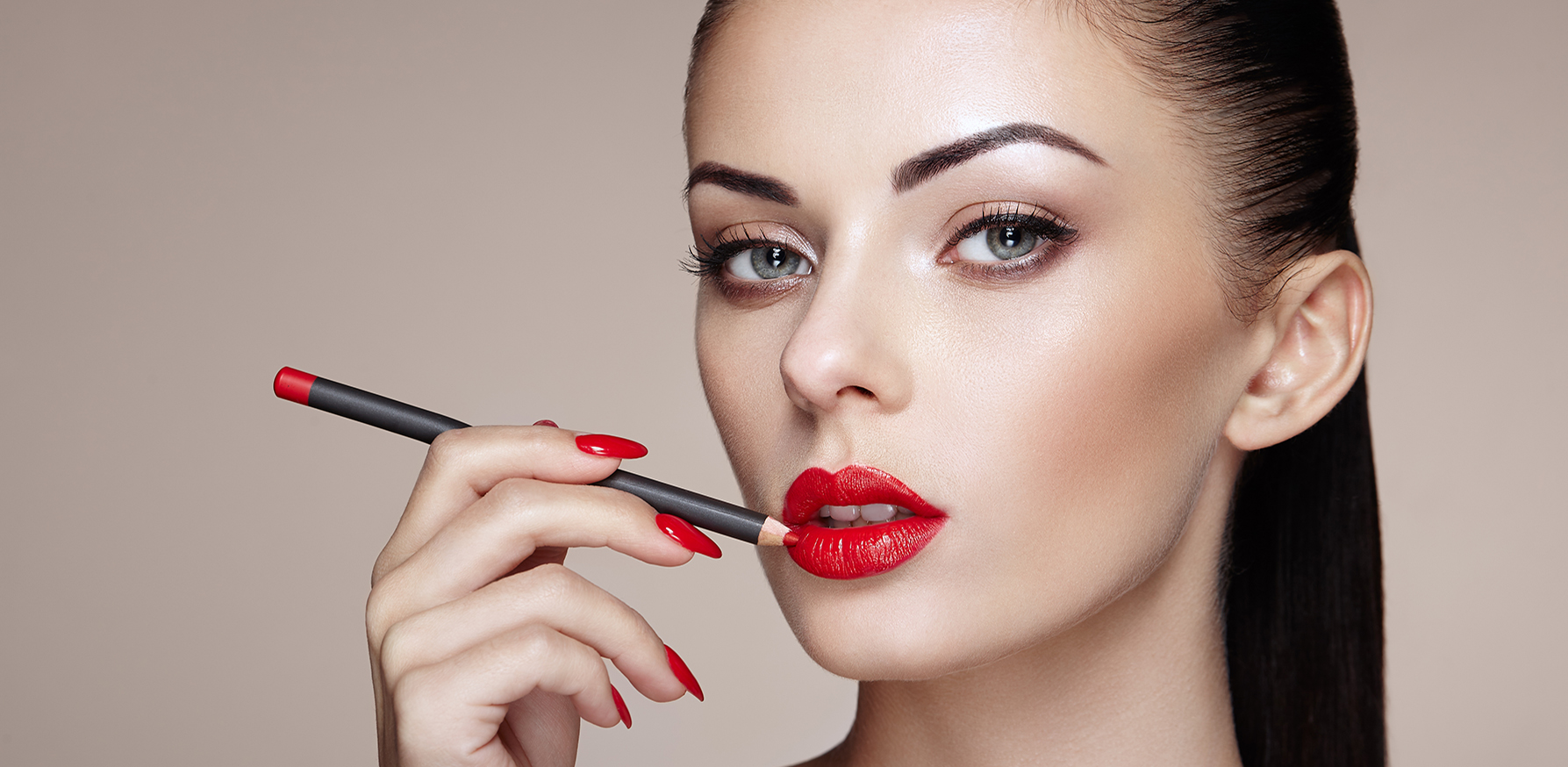drugstore-makeup-brands-on-par-with-high-end-brands-woman-applying-makeup