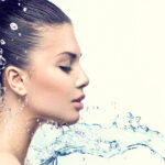 ways-towards-an-eco-friendly-beauty-routine-woman-splashing-water-on-face-skin-care