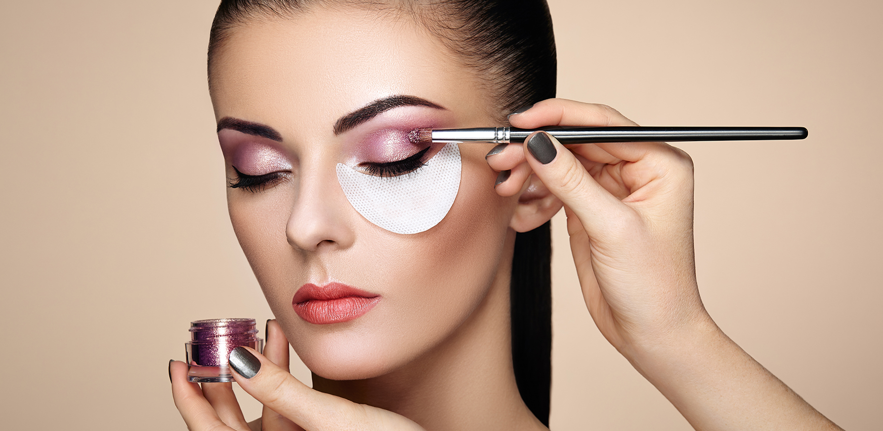eyeliner-looks-for-2023-woman-having-eye-makeup-applied