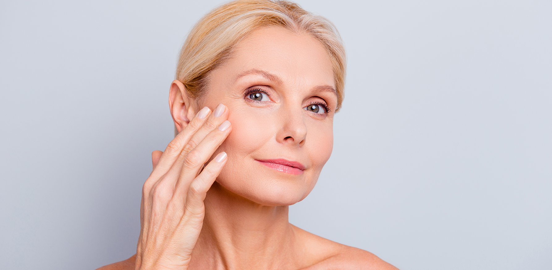 menopause-and-skincare-older-women-with-nice-skin-touching-face