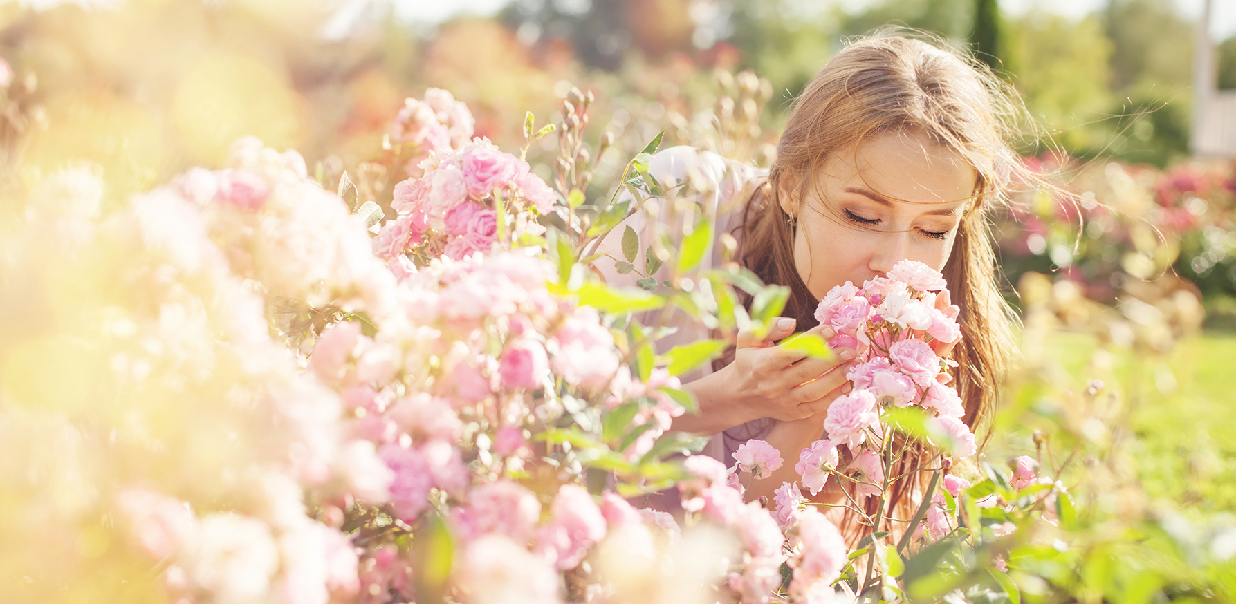 power-of-aromatherapy-woman-smelling-flowers-beautiful-smell